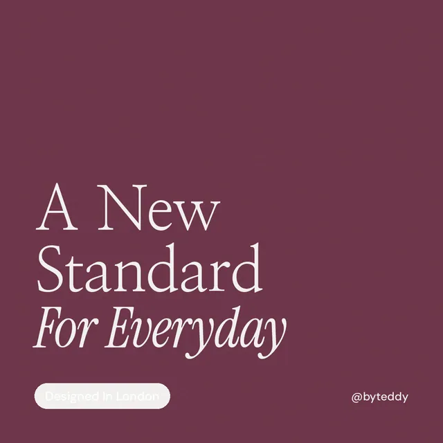 Instagram post for By Teddy: "A New Standard For Everyday". Caption style, technique:mixed type lockup layout, dark palette in red, grey.
